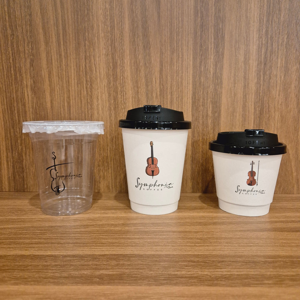 Symphonia Café takeaway cups and a clear drinking cup