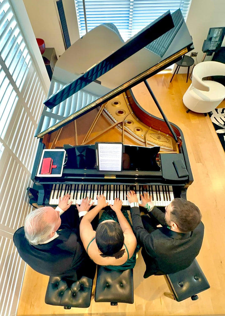 A SYMPHONY OF SIX HANDS