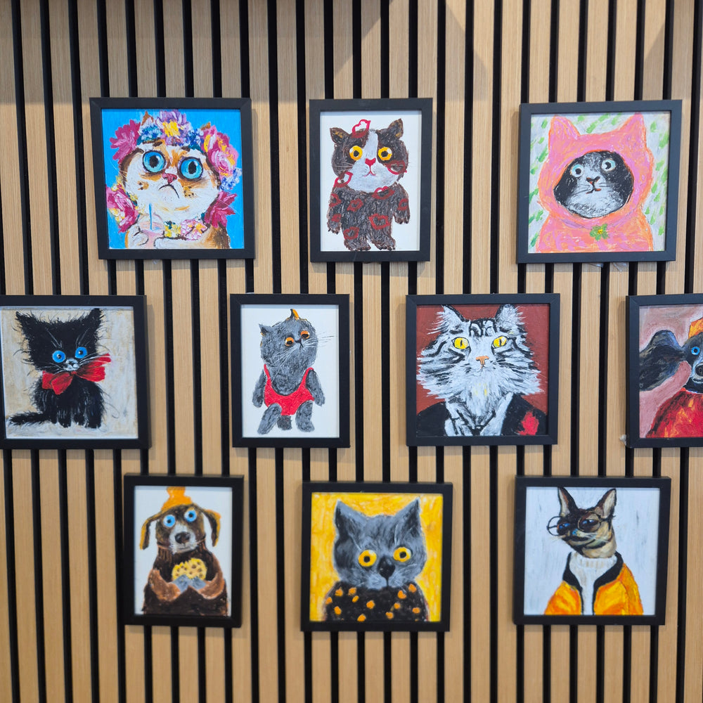 Colourful cat portraits in the Symphonia art exhibition