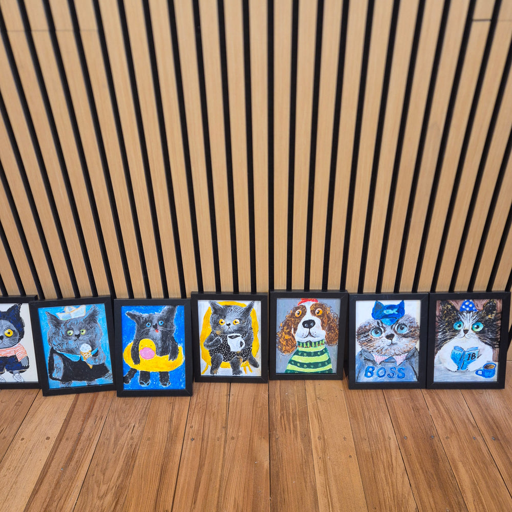 Colourful artwork displayed on the wooden wall
