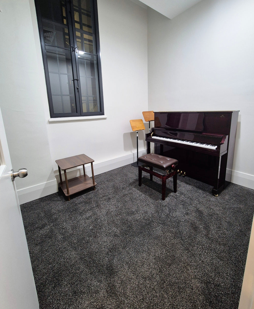 Practice room 3 with an upright piano