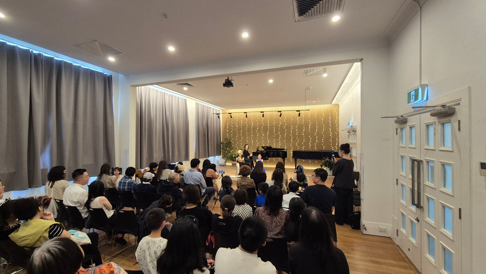 Concert audience facing the stage at Symphonia Hall