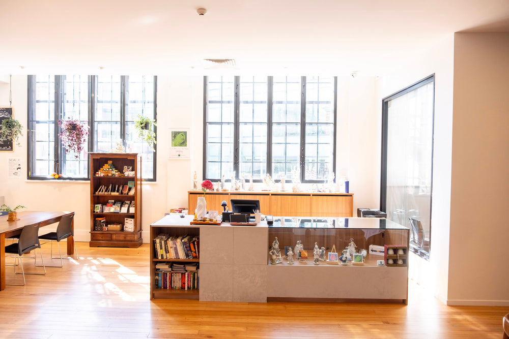 Counter and display cabinets beside the windows at Symphonia Strings