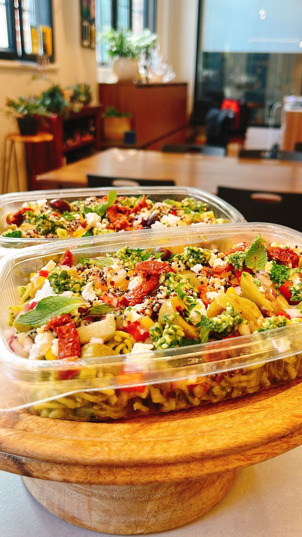 Prepared food platters on the counter at Symphonia Café